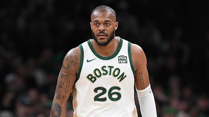 Apr 7, 2024; Boston, Massachusetts, USA; Boston Celtics forward Xavier Tillman Sr. (26) looks on during the second half against the Portland Trail Blazers at TD Garden. Mandatory Credit: Eric Canha-Imagn Images