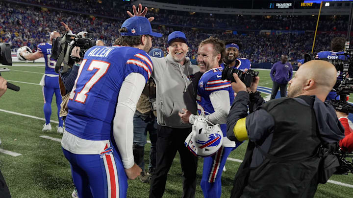 Buffalo Bills quarterback Josh Allen celebrates with head coach Sean McDermott and Matt Prater, who won the game with his successful field goal against the Baltimore Ravens.