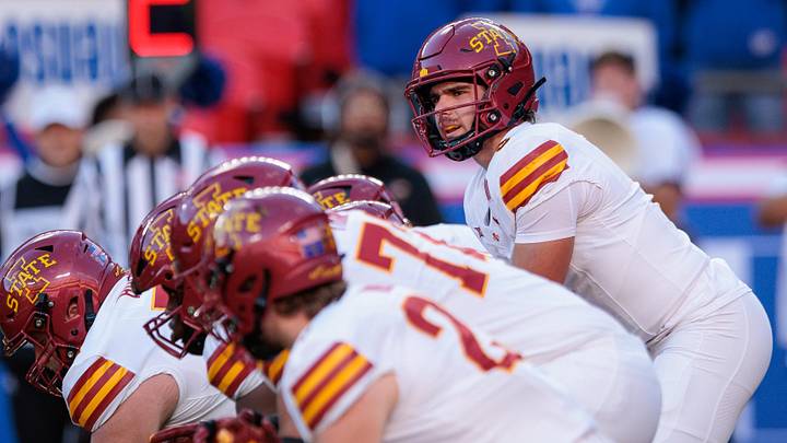 Nov 9, 2024; Kansas City, Missouri, USA; Iowa State Cyclones quarterback Rocco Becht (3) behind the line during the first quarter against the Kansas Jayhawks at GEHA Field at Arrowhead Stadium. Mandatory Credit: William Purnell-Imagn Images Nov 9, 2024; Kansas City, Missouri, USA; Iowa State Cyclones quarterback Rocco Becht (3) behind the line during the first quarter against the Kansas Jayhawks at GEHA Field at Arrowhead Stadium. Mandatory Credit: William Purnell-Imagn Images