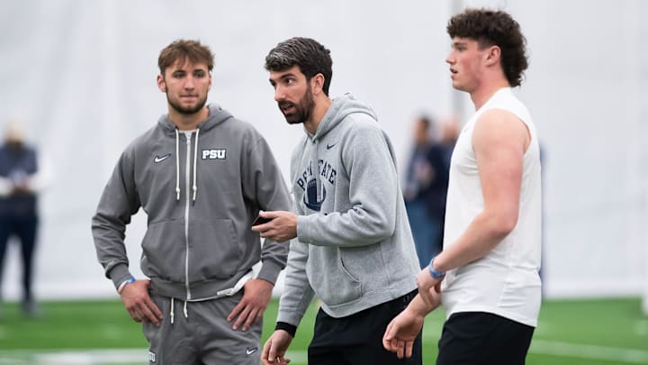 Penn State quarterbacks coach Danny O'Brien, center, talks with Drew Allar, right, and Ethan Grunkemeyer during Penn State Pro Day at Holuba Hall. Penn State quarterbacks coach Danny O'Brien, center, talks with Drew Allar, right, and Ethan Grunkemeyer during Penn State Pro Day at Holuba Hall.