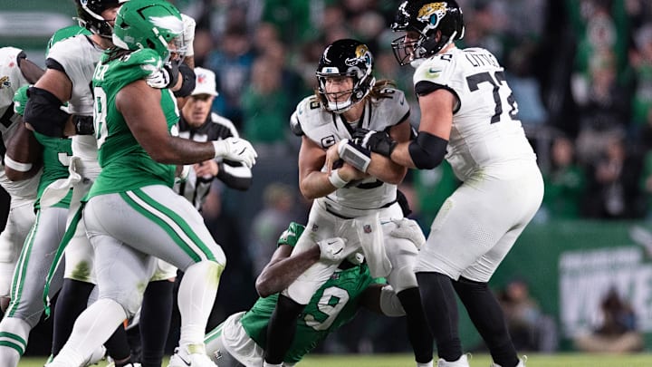 Nov 3, 2024; Philadelphia, Pennsylvania, USA; Jacksonville Jaguars quarterback Trevor Lawrence (16) is sacked by Philadelphia Eagles linebacker Josh Sweat (19) during the fourth quarter at Lincoln Financial Field. 
