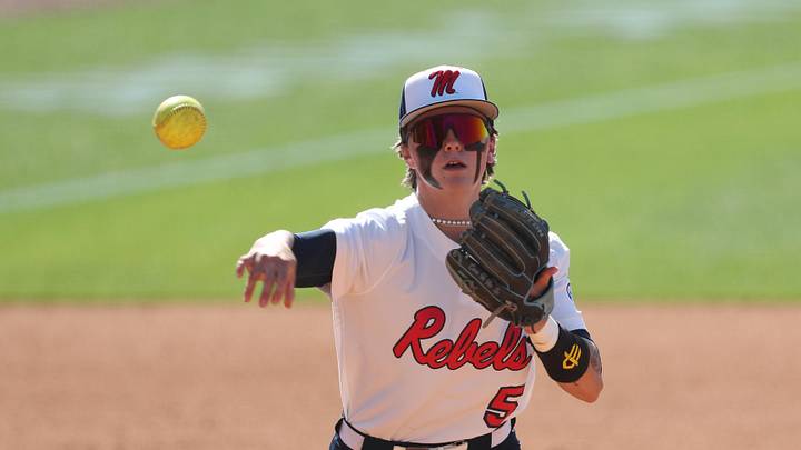 May 6, 2025; Athens, GA, USA; Ole Miss infielder Ashton Lansdell (5) throws to first base for an out during a game against Missouri at Jack Turner Softball Stadium.