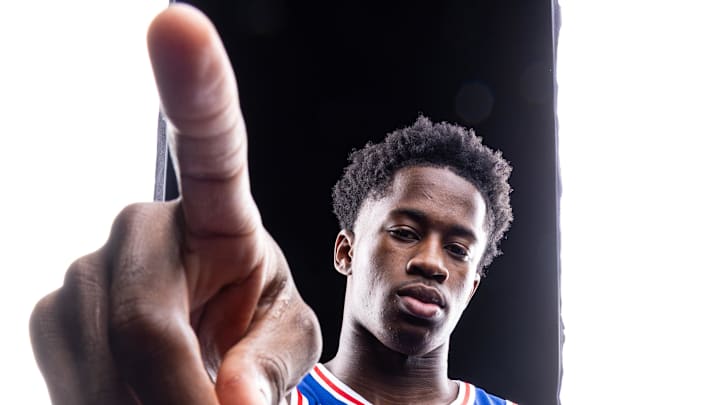 Sep 26, 2025; Camden, NJ, USA; Philadelphia 76ers VJ Edgecombe (77) poses for a photo during media day. Mandatory Credit: Bill Streicher-Imagn Images