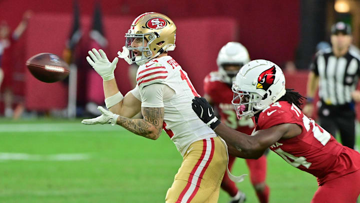 Jan 5, 2025; Glendale, Arizona, USA; San Francisco 49ers wide receiver Ricky Pearsall (14) catches a pass as Arizona Cardinals cornerback Starling Thomas V (24) defends in the second half at State Farm Stadium. Mandatory Credit: Matt Kartozian-Imagn Images Jan 5, 2025; Glendale, Arizona, USA; San Francisco 49ers wide receiver Ricky Pearsall (14) catches a pass as Arizona Cardinals cornerback Starling Thomas V (24) defends in the second half at State Farm Stadium. Mandatory Credit: Matt Kartozian-Imagn Images