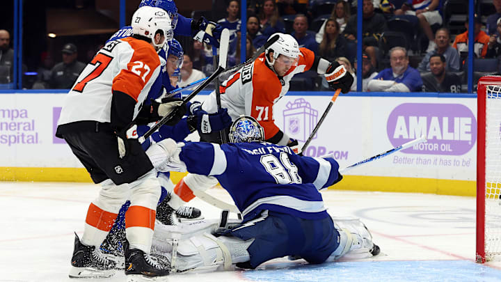Nov 24, 2025; Tampa, Florida, USA; Tampa Bay Lightning goaltender Andrei Vasilevskiy (88) defends Philadelphia Flyers right wing Tyson Foerster (71) during the second period at Benchmark International Arena. Mandatory Credit: Kim Klement Neitzel-Imagn Images