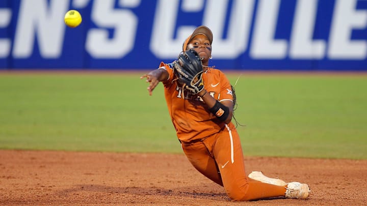 Texas' Janae Jefferson (2) throws back to first in the sixth inning after of the second game of the championship series in the Women's College World Series between the University of Oklahoma Sooners (OU) and the Texas Longhorns at USA Softball Hall of Fame Stadium in Oklahoma City, Thursday, June 9, 2022. 
