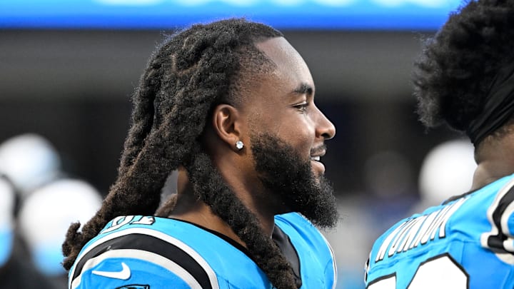 Aug 8, 2025; Charlotte, North Carolina, USA; Carolina Panthers linebacker Patrick Jones II (91) on the sidelines in the second quarter at Bank of America Stadium. Mandatory Credit: Bob Donnan-Imagn Images
