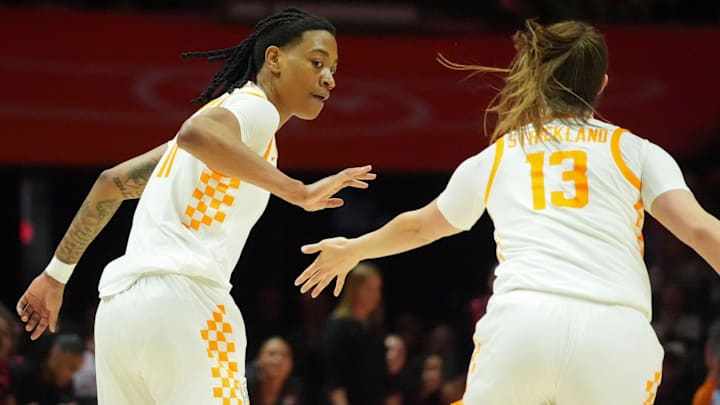Tennessee's Zee Spearman (11) and Avery Strickland (13) celebrate after Spearman scores on an assist from Strickland during an NCAA college basketball game on Sunday, March 2, 2025, in Knoxville, Tenn.