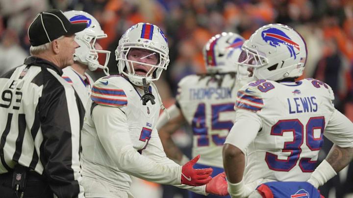 Buffalo Bills cornerback Taron Johnson argues the call for holding with back judge Scott Helverson during overtime at Empower FIeld at Mile High in Denver, Colorado on Jan. 17, 2026.