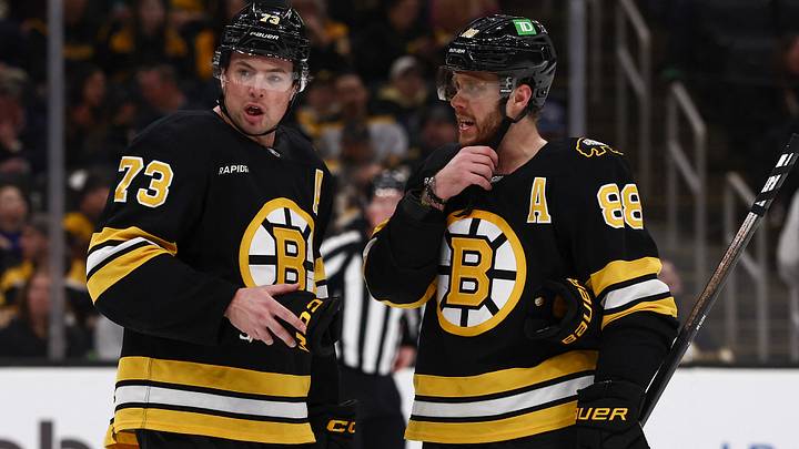 Mar 24, 2026; Boston, Massachusetts, USA; Boston Bruins defenseman Charlie McAvoy (73) talks with right wing David Pastrnak (88) during the third period against the Toronto Maple Leafs at TD Garden. Mandatory Credit: Winslow Townson-Imagn Images