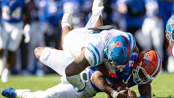 Nov 23, 2024; Gainesville, Florida, USA; Mississippi Rebels defensive tackle Walter Nolen (2) sacks Florida Gators quarterback DJ Lagway (2) during the first half at Ben Hill Griffin Stadium. Mandatory Credit: Matt Pendleton-Imagn Images