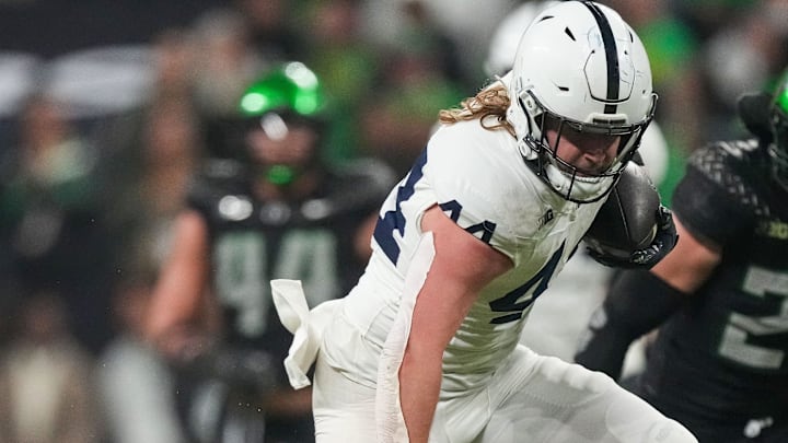 Penn State Nittany Lions tight end Tyler Warren (44) rushes up the field Saturday, Dec. 7, 2024, during the Big Ten Championship game at Lucas Oil Stadium in Indianapolis.