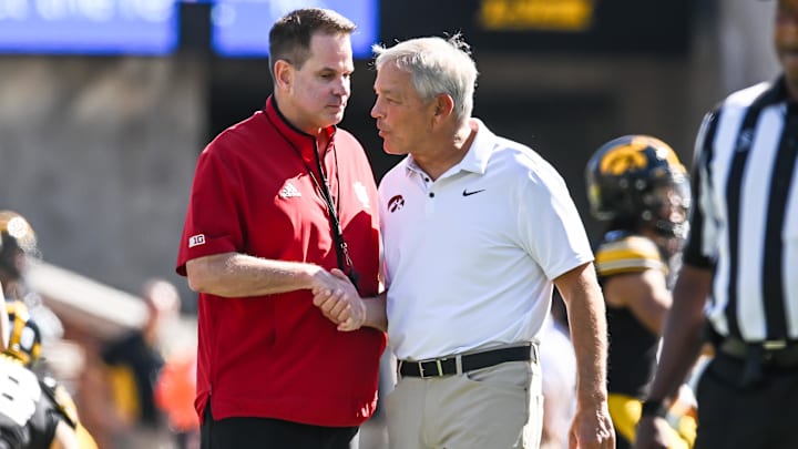 Sep 27, 2025; Iowa City, Iowa, USA; Iowa Hawkeyes head coach Kirk Ferentz and Indiana Hoosiers head coach Curt Cignetti shake hands before the game at Kinnick Stadium. Mandatory Credit: Jeffrey Becker-Imagn Images