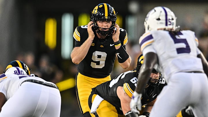 Aug 30, 2025; Iowa City, Iowa, USA; Iowa Hawkeyes quarterback Hank Brown (9) leads the offense during the third quarter against the Albany Great Danes at Kinnick Stadium. Mandatory Credit: Jeffrey Becker-Imagn Images