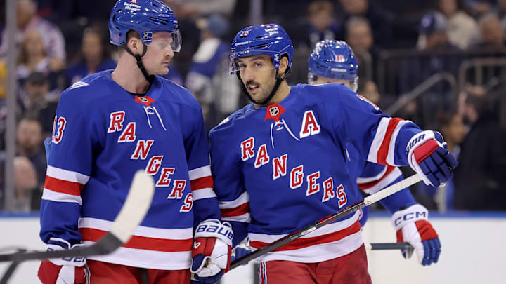 Nov 10, 2025; New York, New York, USA; New York Rangers center Vincent Trocheck (16) talks to left wing Alexis Lafreniere (13) during the first period against the Nashville Predators at Madison Square Garden. Mandatory Credit: Brad Penner-Imagn Images