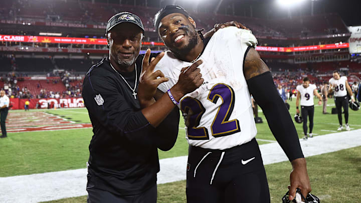 Oct 21, 2024; Tampa, Florida, USA; Baltimore Ravens running back Derrick Henry (22) celebrates with running back coach Willie Taggart after they beat the Tampa Bay Buccaneers at Raymond James Stadium. Mandatory Credit: Kim Klement Neitzel-Imagn Images
