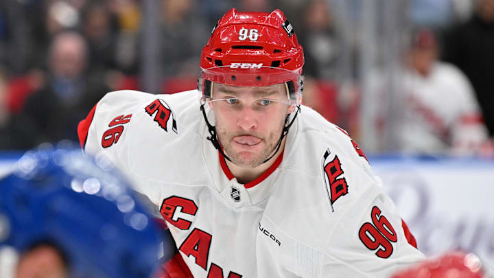 Feb 22, 2025; Toronto, Ontario, CAN;  Carolina Hurricanes forward Mikko Rantanen (96) prepares for a face-off against the Toronto Maple Leafs in the second period at Scotiabank Arena. Mandatory Credit: Dan Hamilton-Imagn Images
