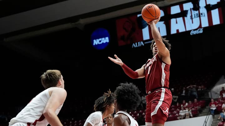 The University of Alabama unveiled the first banner honoring the school’s first Final Four appearance Friday, Oct. 11, 2024, in Coleman Coliseum. Alabama guard Mark Sears (1) sails in for a basket during the scrimmage following the unveiling.