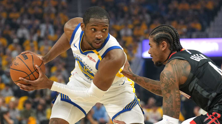 Apr 26, 2025; San Francisco, California, USA; Golden State Warriors forward Jonathan Kuminga (left) handles the ball against Houston Rockets guard Jalen Green (right) during the first quarter of game three of first round for the 2024 NBA Playoffs at Chase Center. Mandatory Credit: Darren Yamashita-Imagn Images Apr 26, 2025; San Francisco, California, USA; Golden State Warriors forward Jonathan Kuminga (left) handles the ball against Houston Rockets guard Jalen Green (right) during the first quarter of game three of first round for the 2024 NBA Playoffs at Chase Center. Mandatory Credit: Darren Yamashita-Imagn Images