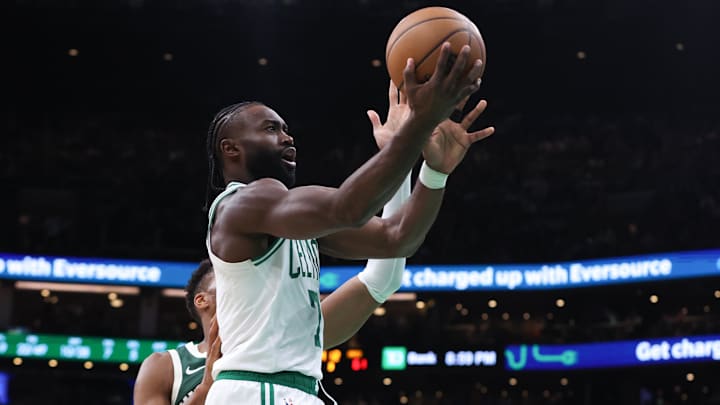 Oct 28, 2024; Boston, Massachusetts, USA; Boston Celtics forward Jaylen Brown (7) drives to the basket defended by Milwaukee Bucks forward Giannis Antetokounmpo (34) during the second half at TD Garden. Mandatory Credit: Paul Rutherford-Imagn Images