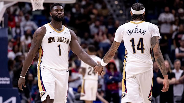 New Orleans Pelicans forward Brandon Ingram (14) slaps hands with forward Zion Williamson (1) after a play against the Indiana Pacers during the second half at Smoothie King Center. Mandatory Credit: Stephen Lew-Imagn Images