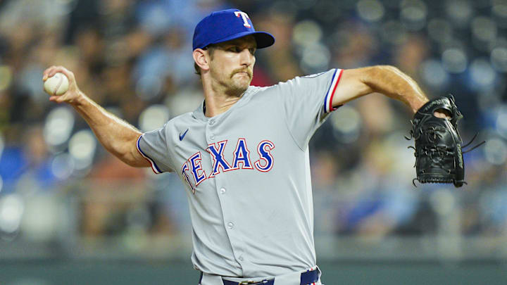 Texas Rangers relief pitcher Caleb Boushley (70) pitches during the eighth inning against the Kansas City Royals at Kauffman Stadium. 