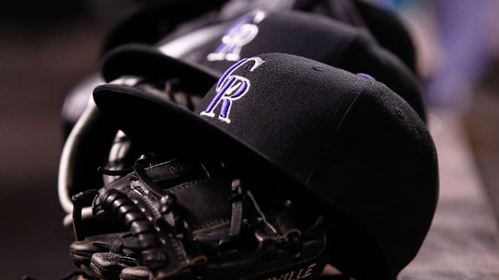 Apr 20, 2015; Denver, CO, USA; A general view of gloves and hats in the Colorado Rockies dugout during the fifth inning against the San Diego Padres at Coors Field. Mandatory Credit: Isaiah J. Downing-Imagn Images