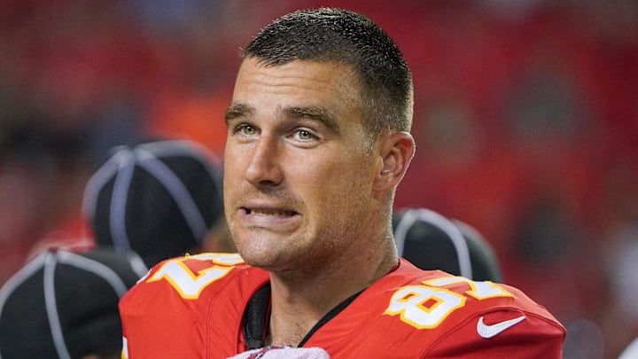 Aug 27, 2021; Kansas City, Missouri, USA; Kansas City Chiefs tight end Travis Kelce (87) on the sidelines against the Minnesota Vikings during the game at GEHA Field at Arrowhead Stadium. Mandatory Credit: Denny Medley-Imagn Images
