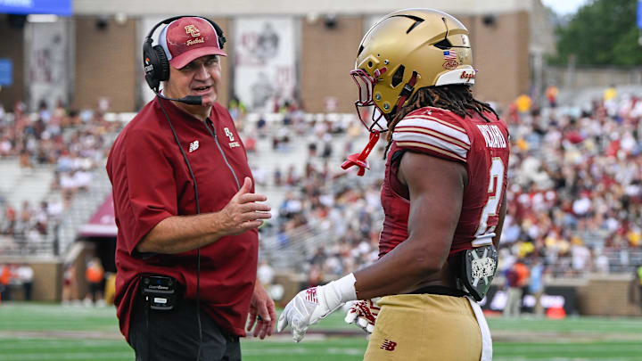 Aug 30, 2025; Chestnut Hill, Massachusetts, USA; Boston College Eagles head coach Bill O'Brien congratulates running back Turbo Richard (2) on his touchdown against the Fordham Rams during the second half at Alumni Stadium. Mandatory Credit: Eric Canha-Imagn Images Aug 30, 2025; Chestnut Hill, Massachusetts, USA; Boston College Eagles head coach Bill O'Brien congratulates running back Turbo Richard (2) on his touchdown against the Fordham Rams during the second half at Alumni Stadium. Mandatory Credit: Eric Canha-Imagn Images