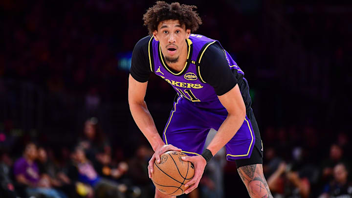 Feb 6, 2025; Los Angeles, California, USA; Los Angeles Lakers center Jaxson Hayes (11) controls the ball against the Golden State Warriors during the first half at Crypto.com Arena. Mandatory Credit: Gary A. Vasquez-Imagn Images