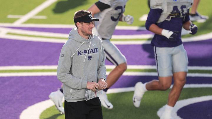Kansas State head coach Collin Klein walks the field during practice on Tuesday, April 21, 2026. The first-year head coach and his staff continue to build momentum on the recruiting trail Kansas State head coach Collin Klein walks the field during practice on Tuesday, April 21, 2026. The first-year head coach and his staff continue to build momentum on the recruiting trail