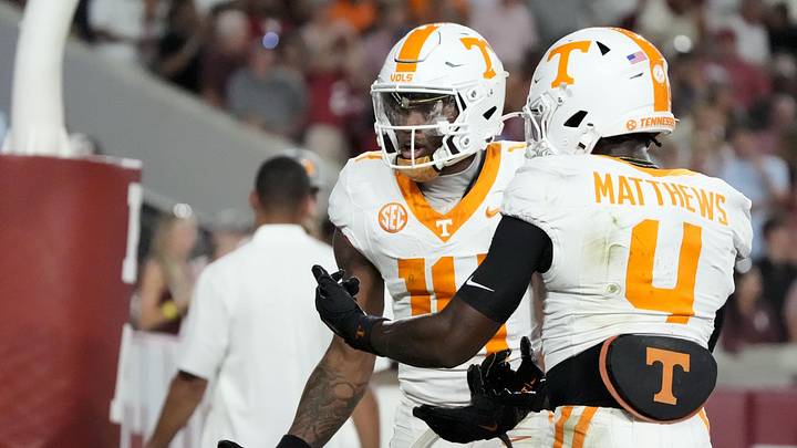 Oct 18, 2025; Tuscaloosa, Alabama, USA; Tennessee wide receiver Braylon Staley (14) and Tennessee wide receiver Mike Matthews (4) celebrate at touchdown in the second quarter against the Alabama Crimson Tide at Saban Field at Bryant-Denny Stadium. Mandatory Credit: Gary Cosby-USA TODAY Network via Imagn Images