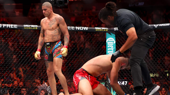 Jun 29, 2024; Las Vegas, Nevada, USA; Alex Pereira (red gloves) reacts after defeating Jiri Prochazka (blue gloves) during UFC 303 at T-Mobile Arena. Mandatory Credit: Mark J. Rebilas-USA TODAY Sports