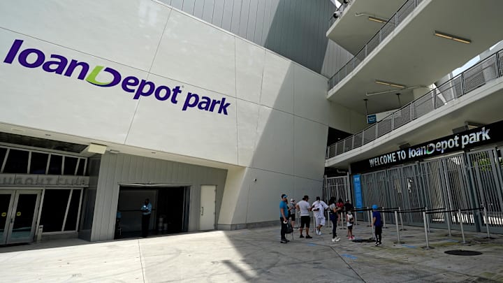 Apr 1, 2021; Miami, Florida, USA; Fans wait to enter the park prior to the game between the Miami Marlins and the Tampa Bay Rays at loanDepot park. Apr 1, 2021; Miami, Florida, USA; Fans wait to enter the park prior to the game between the Miami Marlins and the Tampa Bay Rays at loanDepot park.