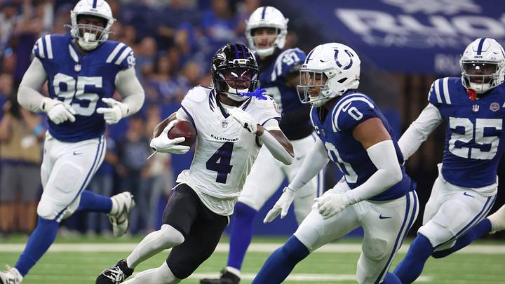 Baltimore Ravens wide receiver Zay Flowers (4) runs with the ball against the Indianapolis Colts at Lucas Oil Stadium.
