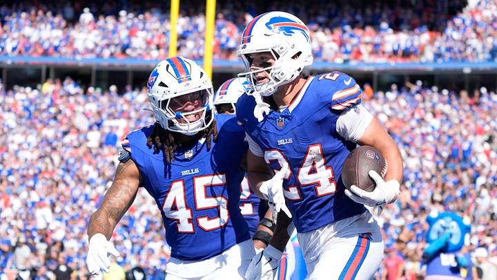 Sep 28, 2025; Orchard Park, New York, USA; Buffalo Bills safety Cole Bishop (24) and outside linebacker Shaq Thompson (45) celebrate after intercepting a pass i Sep 28, 2025; Orchard Park, New York, USA; Buffalo Bills safety Cole Bishop (24) and outside linebacker Shaq Thompson (45) celebrate after intercepting a pass i