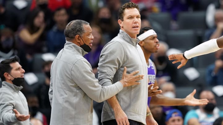 Nov 20, 2021; Sacramento, California, USA; Sacramento Kings head coach Luke Walton is restrained by assistant coach Alvin Gentry during the second quarter against the Utah Jazz at Golden 1 Center. Mandatory Credit: Darren Yamashita-USA TODAY Sports Nov 20, 2021; Sacramento, California, USA; Sacramento Kings head coach Luke Walton is restrained by assistant coach Alvin Gentry during the second quarter against the Utah Jazz at Golden 1 Center. Mandatory Credit: Darren Yamashita-USA TODAY Sports