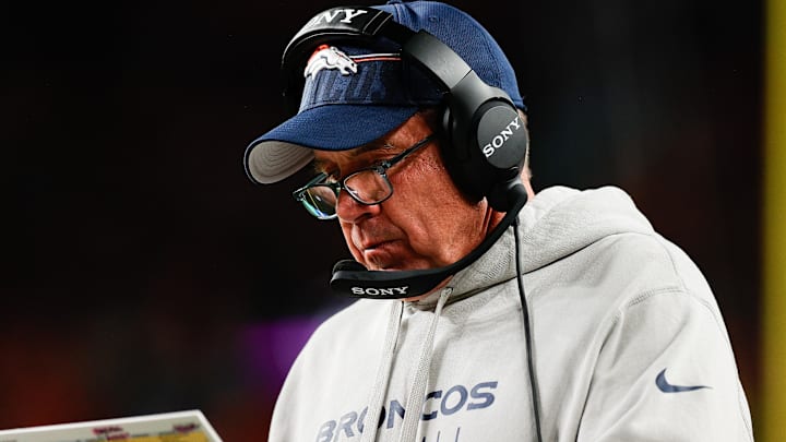 Sep 29, 2025; Denver, Colorado, USA; Denver Broncos head coach Sean Payton looks at his notes during the third quarter against the Cincinnati Bengals at Empower Field at Mile High. Sep 29, 2025; Denver, Colorado, USA; Denver Broncos head coach Sean Payton looks at his notes during the third quarter against the Cincinnati Bengals at Empower Field at Mile High.