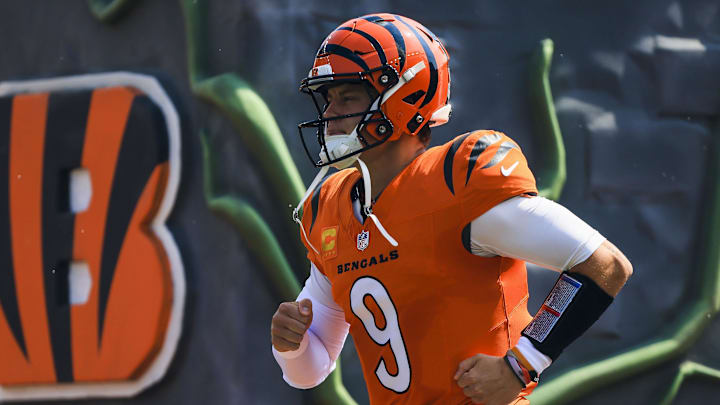 Sep 14, 2025; Cincinnati, Ohio, USA; Cincinnati Bengals quarterback Joe Burrow (9) runs onto the field before the game against the Jacksonville Jaguars at Paycor Stadium. Mandatory Credit: Katie Stratman-Imagn Images