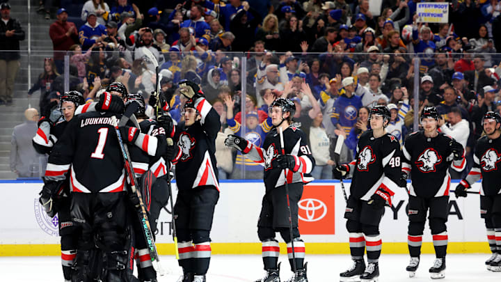 Buffalo Sabres players and fans at the KeyBank Center Buffalo Sabres players and fans at the KeyBank Center