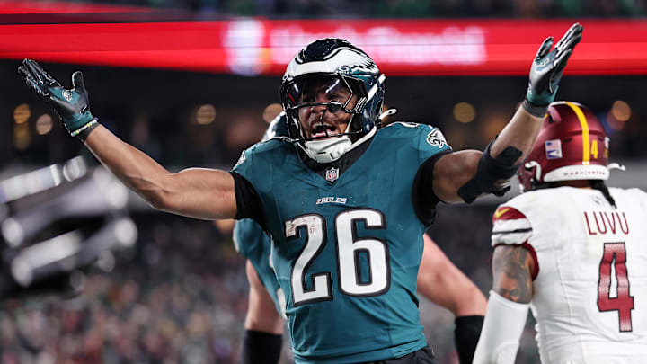 Philadelphia Eagles running back Saquon Barkley (26) celebrates after a touchdown against the Washington Commanders during the second half in the NFC Championship game at Lincoln Financial Field. 