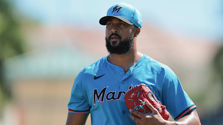 Feb 28, 2025; Jupiter, Florida, USA; Miami Marlins starting pitcher Sandy Alcantara (22) looks on against the Atlanta Braves during the second inning at Roger Dean Chevrolet Stadium. Mandatory Credit: Sam Navarro-Imagn Images