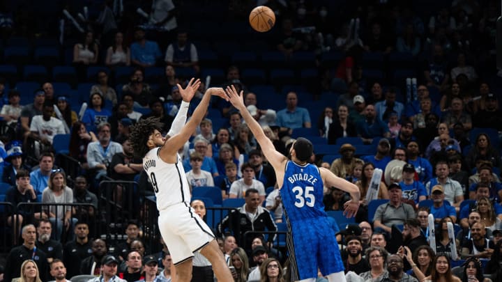 Brooklyn Nets forward Trendon Watford (9) shoots the ball over Orlando Magic center Goga Bitadze (35) in the fourth quarter at Kia Center. 