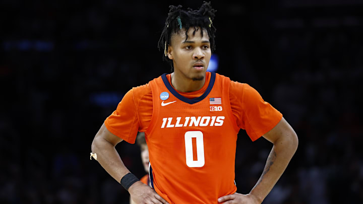 Mar 30, 2024; Boston, MA, USA; Illinois Fighting Illini guard Terrence Shannon Jr. (0) reacts against the Connecticut Huskies in the finals of the East Regional of the 2024 NCAA Tournament at TD Garden. Mandatory Credit: Winslow Townson-Imagn Images