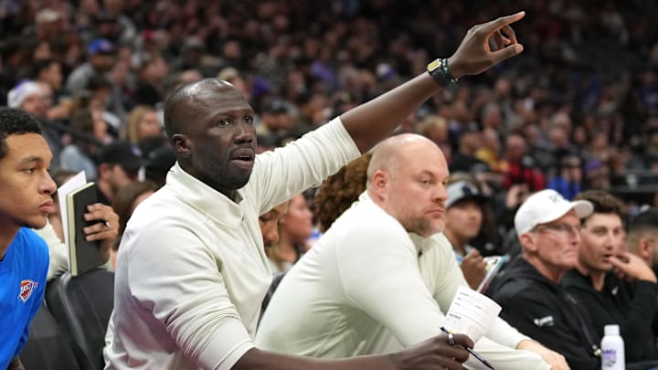 Dec 14, 2023; Sacramento, California, USA; Oklahoma City Thunder assistant coach David Akinyooye gestures during the third quarter against the Sacramento Kings at Golden 1 Center. 