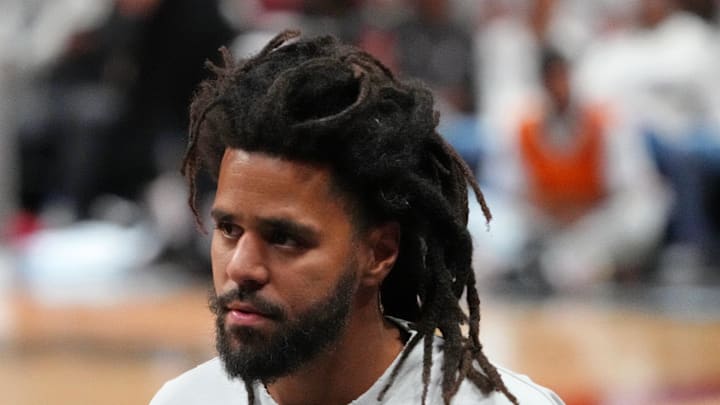 J. Cole walks off the court