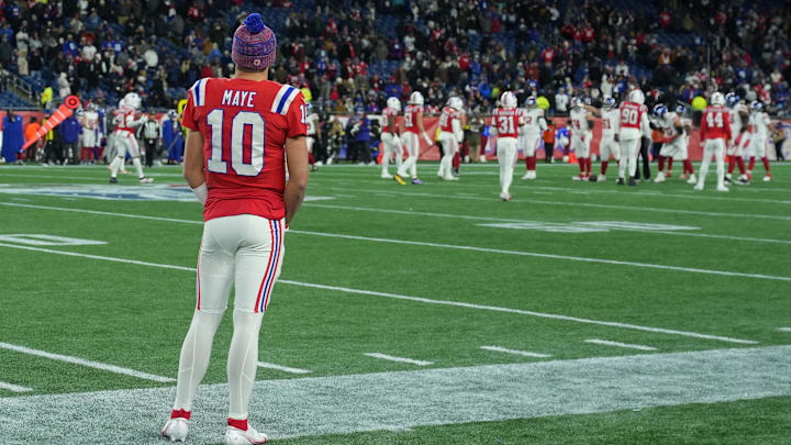 Dec 1, 2025; Foxborough, Massachusetts, USA; New England Patriots quarterback Drake Maye (10) watches from the sideline durin Dec 1, 2025; Foxborough, Massachusetts, USA; New England Patriots quarterback Drake Maye (10) watches from the sideline durin