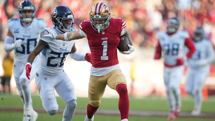 Dec 14, 2025; Santa Clara, California, USA; San Francisco 49ers wide receiver Ricky Pearsall (1) stiff arms Tennessee Titans cornerback Marcus Harris (26) during the third quarter at Levi's Stadium. Mandatory Credit: Cary Edmondson-Imagn Images Dec 14, 2025; Santa Clara, California, USA; San Francisco 49ers wide receiver Ricky Pearsall (1) stiff arms Tennessee Titans cornerback Marcus Harris (26) during the third quarter at Levi's Stadium. Mandatory Credit: Cary Edmondson-Imagn Images