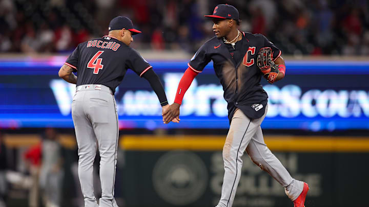 Apr 11, 2026: Cleveland Guardians shortstop Brayan Rocchio (4) and left fielder Angel Martinez (1) celebrate after a victory over the Atlanta Braves at Truist Park. 