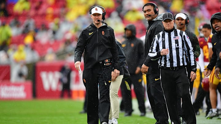 Nov 15, 2025; Los Angeles, California, USA; Southern California Trojans head coach Lincoln Riley watches game action against the Iowa Hawkeyes during the first half at the Los Angeles Memorial Coliseum. Mandatory Credit: Gary A. Vasquez-Imagn Images Nov 15, 2025; Los Angeles, California, USA; Southern California Trojans head coach Lincoln Riley watches game action against the Iowa Hawkeyes during the first half at the Los Angeles Memorial Coliseum. Mandatory Credit: Gary A. Vasquez-Imagn Images